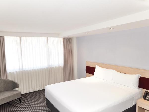 Central Studio Hotel Sydney : photo 1 de la chambre chambre lit king-size deluxe