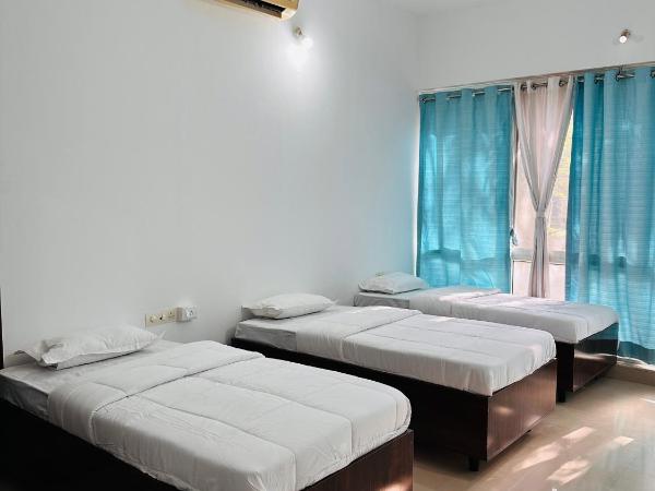 Elite stays viman nagar : photo 1 de la chambre chambre triple - vue sur ville