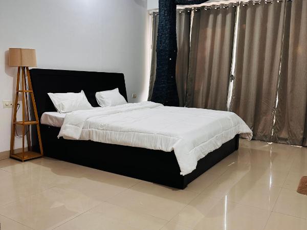 Elite stays viman nagar : photo 2 de la chambre chambre lit king-size deluxe