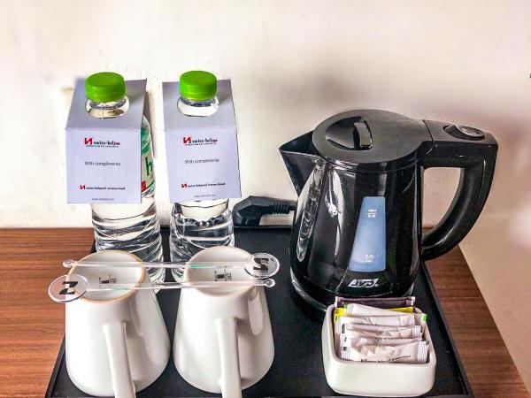 Swiss-Belinn Kemayoran : photo 1 de la chambre chambre double supérieure deluxe