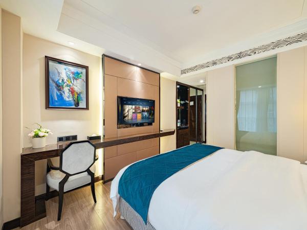 Evening Breeze Hotel 晚风酒店 : photo 3 de la chambre chambre lit king-size - vue sur ville