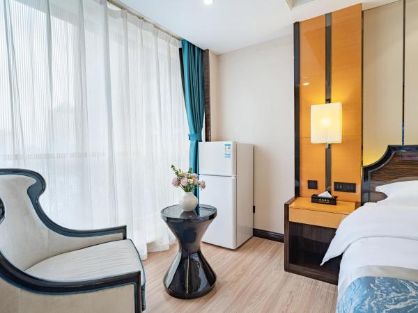 Evening Breeze Hotel 晚风酒店 : photo 5 de la chambre city view standard king room