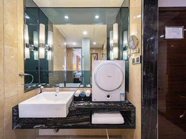 Evening Breeze Hotel 晚风酒店 : photo 6 de la chambre city view standard king room