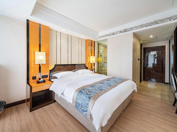 Evening Breeze Hotel 晚风酒店 : photo 3 de la chambre city view standard king room