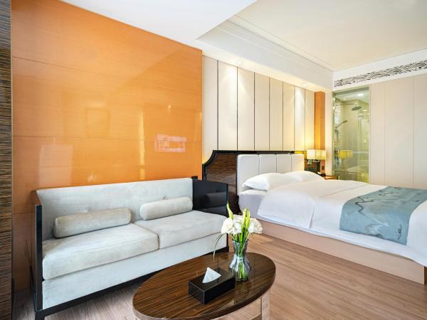 Evening Breeze Hotel 晚风酒店 : photo 1 de la chambre city view executive king room