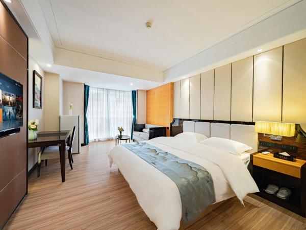 Evening Breeze Hotel 晚风酒店 : photo 5 de la chambre city view executive king room