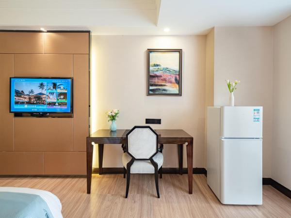 Evening Breeze Hotel 晚风酒店 : photo 6 de la chambre city view executive king room