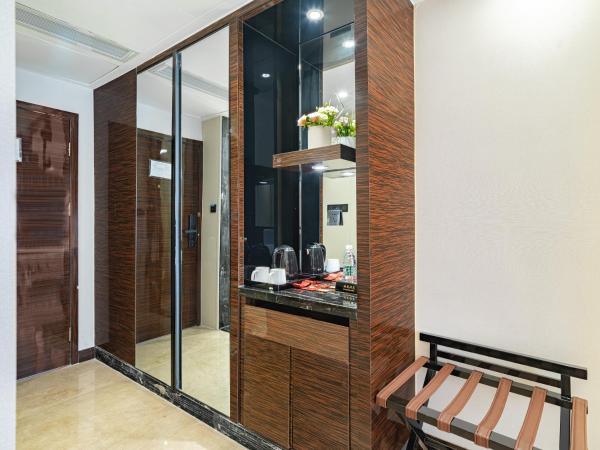 Evening Breeze Hotel 晚风酒店 : photo 7 de la chambre city view executive king room