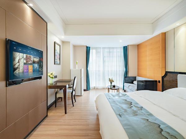 Evening Breeze Hotel 晚风酒店 : photo 2 de la chambre city view executive king room