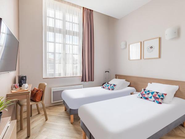 Appart'City Confort Reims Centre : photo 2 de la chambre studio lits jumeaux