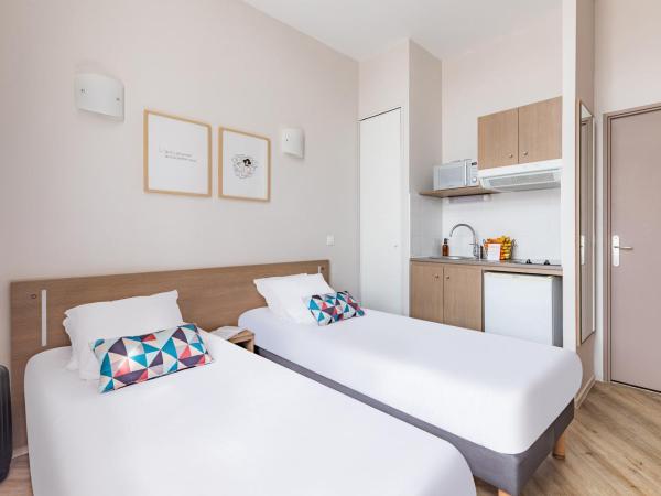 Appart'City Confort Reims Centre : photo 3 de la chambre studio lits jumeaux