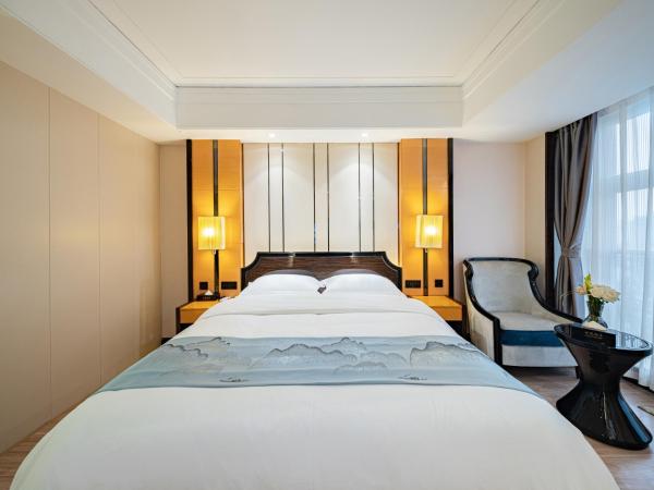 Evening Breeze Hotel 晚风酒店 : photo 2 de la chambre chambre king-size de luxe - vue sur la ville
