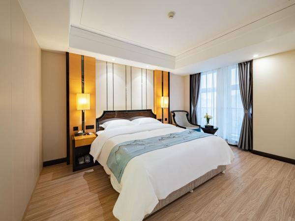 Evening Breeze Hotel 晚风酒店 : photo 1 de la chambre chambre king-size de luxe - vue sur la ville
