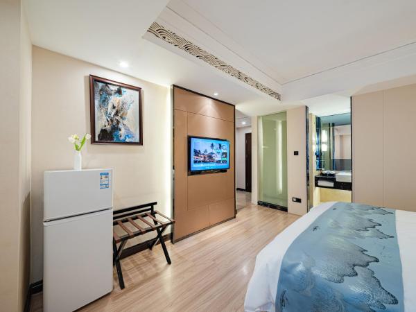 Evening Breeze Hotel 晚风酒店 : photo 3 de la chambre chambre king-size de luxe - vue sur la ville