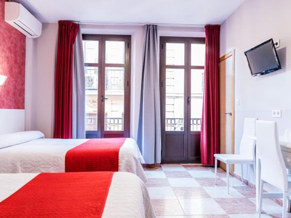 Hostal Sonia Granada : photo 4 de la chambre chambre quadruple