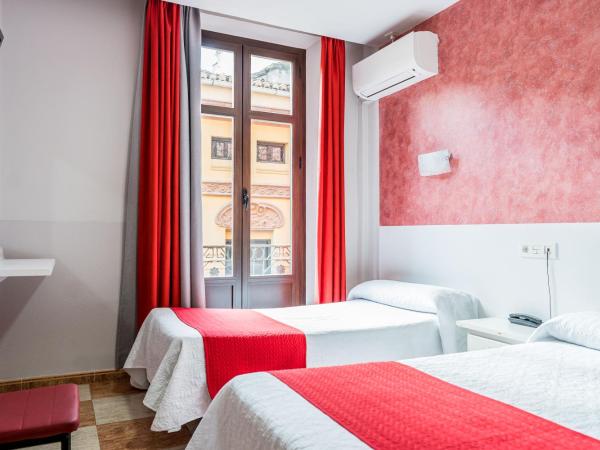 Hostal Sonia Granada : photo 5 de la chambre chambre triple