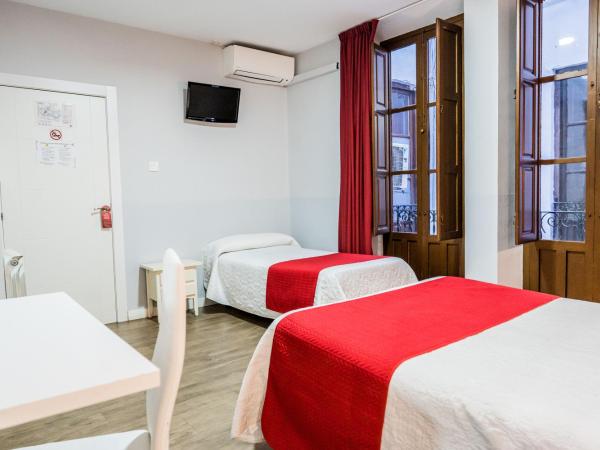 Hostal Sonia Granada : photo 8 de la chambre chambre triple