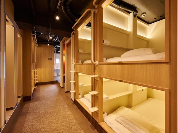 ホテルコンテニュー二条城北 : photo 1 de la chambre lit simple dans dortoir pour femmes