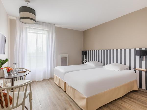 Appart'City Classic Reims Parc des Expositions : photo 2 de la chambre studio lits jumeaux