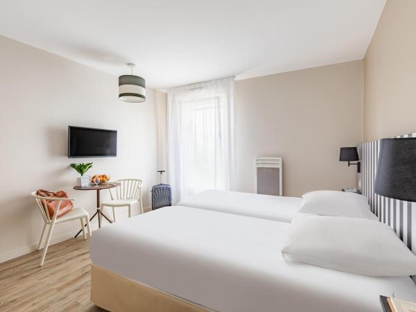 Appart'City Classic Reims Parc des Expositions : photo 4 de la chambre studio lits jumeaux