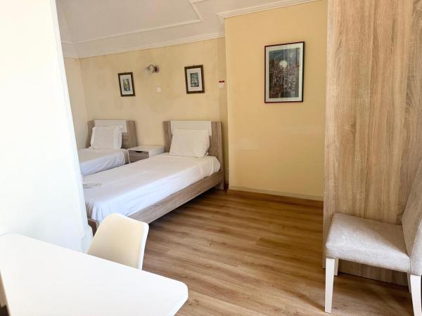 Central Guest House : photo 3 de la chambre chambre quadruple