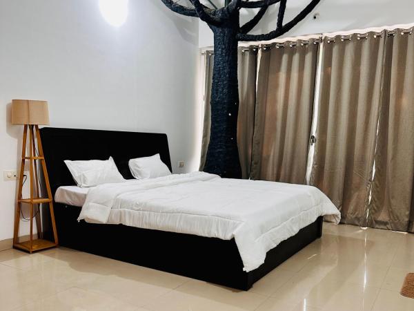 Elite stays viman nagar : photo 3 de la chambre chambre lit king-size deluxe