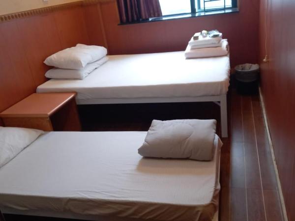 New Garden Hostel : photo 4 de la chambre chambre triple avec salle de bains commune