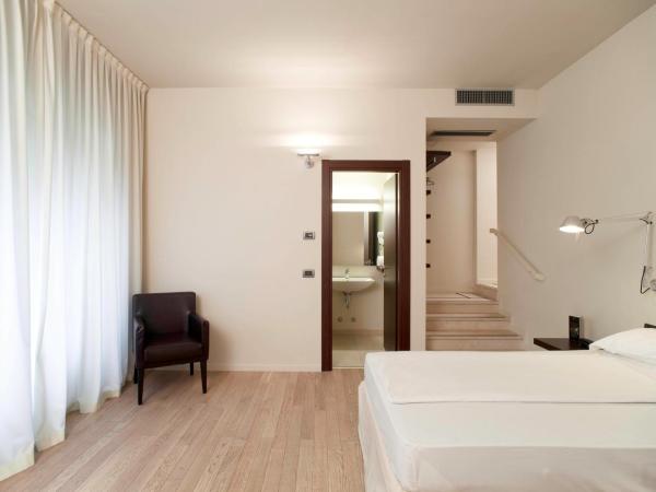 I Portici Hotel Bologna : photo 1 de la chambre chambre lits jumeaux supérieure