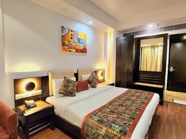 The Prime Balaji Deluxe at New Delhi Railway Station - Free Airport Pickup : photo 1 de la chambre chambre double ou lits jumeaux de luxe avec service de navette aéroport gratuit