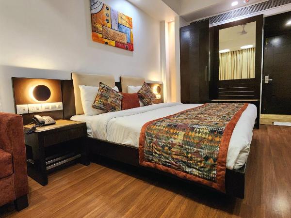 The Prime Balaji Deluxe at New Delhi Railway Station - Free Airport Pickup : photo 6 de la chambre chambre double ou lits jumeaux de luxe avec service de navette aéroport gratuit