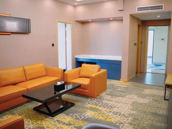 南京工业职业技术大学松山湖生态酒店 : photo 3 de la chambre suite