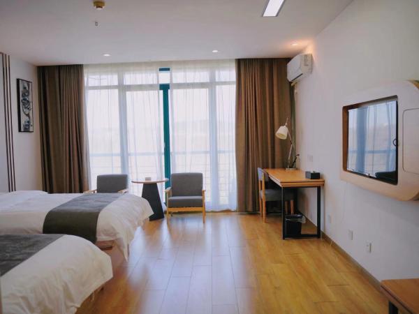 南京工业职业技术大学松山湖生态酒店 : photo 2 de la chambre chambre lits jumeaux supérieure