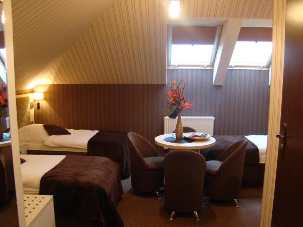 Apart A2 Bezobsługowy 24h Poznań : photo 3 de la chambre chambre triple avec salle de bains privative