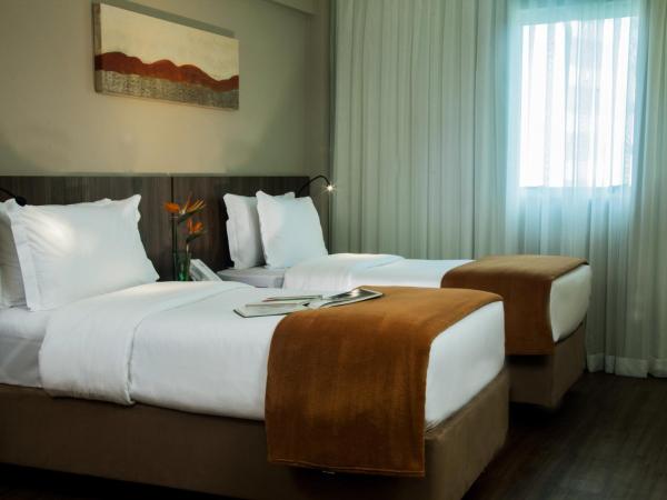 BH Raja Hotel : photo 9 de la chambre chambre lits jumeaux deluxe