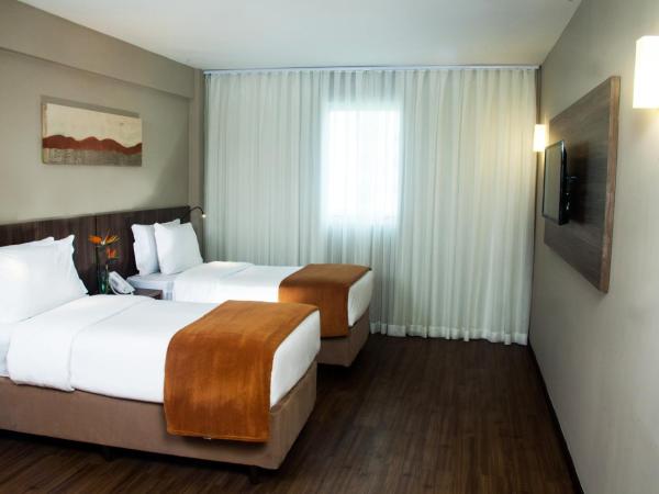 BH Raja Hotel : photo 7 de la chambre chambre lits jumeaux deluxe