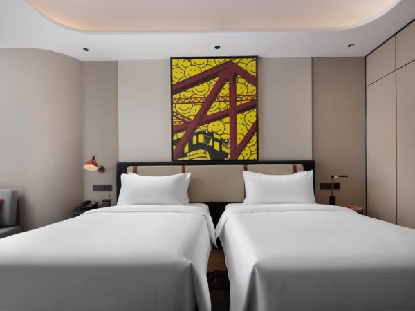 Radisson Red Guangzhou South Railway Station-Canton Fair free shuttle bus & designated license points & Free VPN network : photo 3 de la chambre chambre lits jumeaux supérieure
