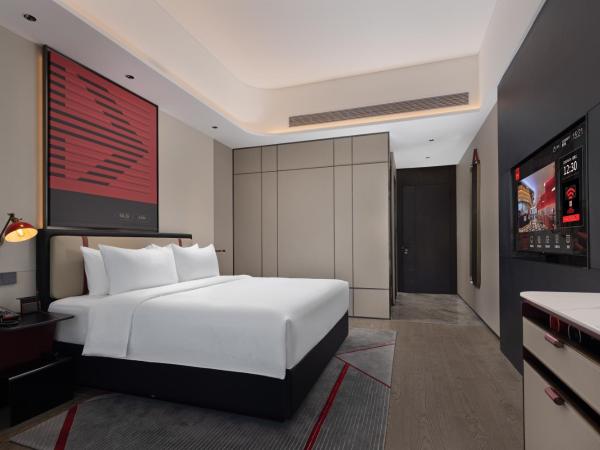 Radisson Red Guangzhou South Railway Station-Canton Fair free shuttle bus & designated license points & Free VPN network : photo 3 de la chambre chambre lit queen-size deluxe