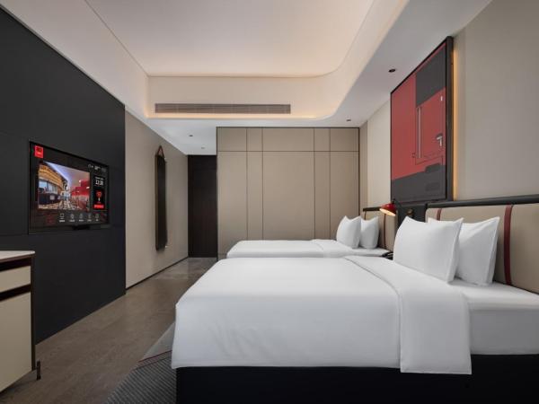 Radisson Red Guangzhou South Railway Station-Canton Fair free shuttle bus & designated license points & Free VPN network : photo 2 de la chambre chambre lits jumeaux deluxe
