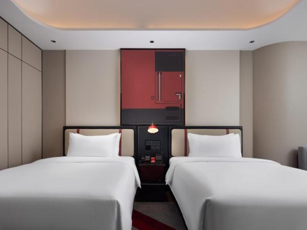 Radisson Red Guangzhou South Railway Station-Canton Fair free shuttle bus & designated license points & Free VPN network : photo 3 de la chambre chambre lits jumeaux deluxe