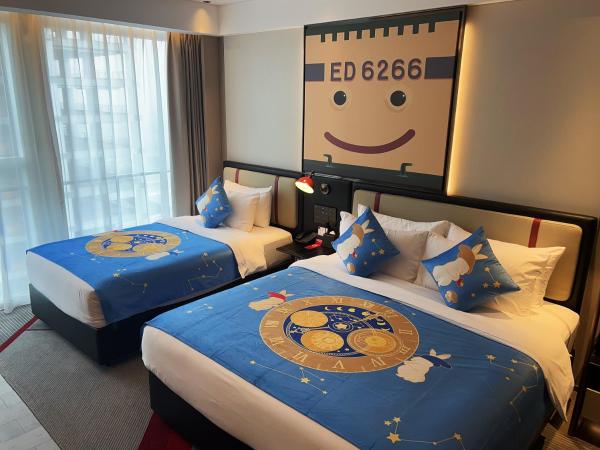 Radisson Red Guangzhou South Railway Station-Canton Fair free shuttle bus & designated license points & Free VPN network : photo 1 de la chambre chambre familiale
