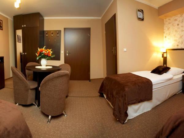 Apart A2 Bezobsługowy 24h Poznań : photo 2 de la chambre chambre triple avec salle de bains privative