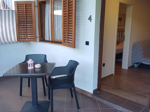 Apartments & Rooms Darrer : photo 7 de la chambre appartement - vue sur jardin