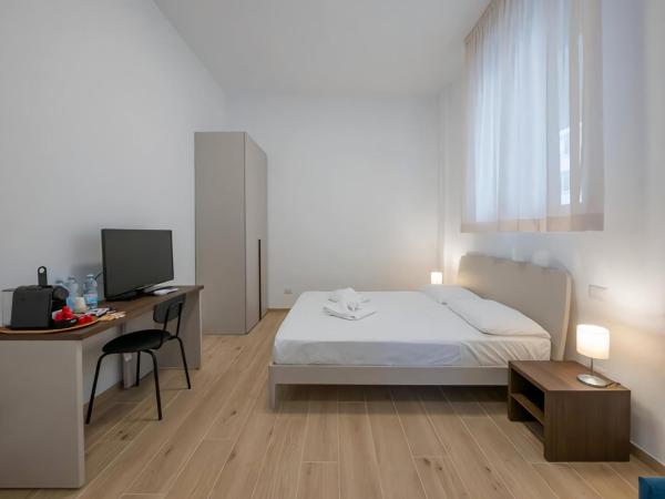 Casa Sforza IEO Suite : photo 1 de la chambre chambre quadruple