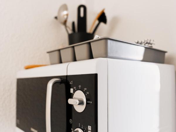 Hôtel Les Fougères : photo 7 de la chambre chambre double avec balcon et kitchenette - vue sur piscine