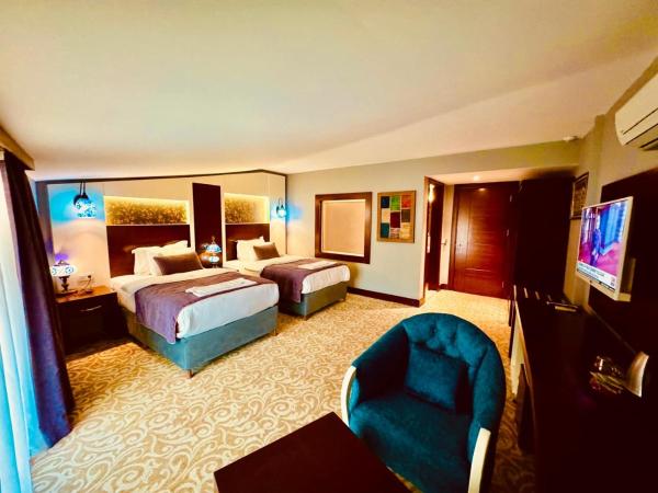 Pamukkale Whiteheaven Suite Hotel : photo 1 de la chambre chambre lits jumeaux avec balcon