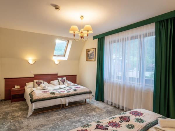 Willa Monte Rosa : photo 2 de la chambre hébergement quadruple de luxe