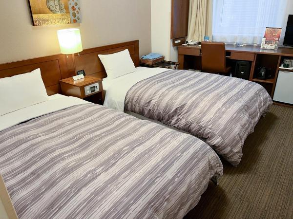 Hotel Route-Inn Sapporo Ekimae Kitaguchi : photo 1 de la chambre chambre lits jumeaux - fumeurs