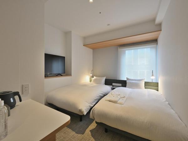 Prince Smart Inn Osaka Yodoyabashi : photo 1 de la chambre superior compact twin room with complimentary breakfast