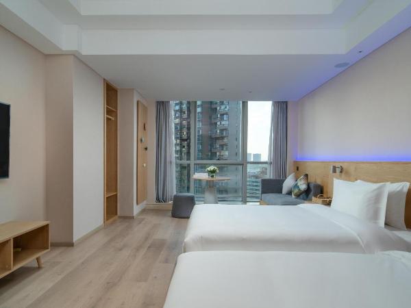 Westlake Art Hotel -Xiasha University Town Branch : photo 1 de la chambre chambre lits jumeaux deluxe