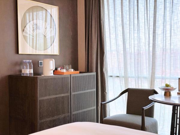 Beijing Xiamenair Jianianhua Hotel : photo 2 de la chambre chambre lits jumeaux supérieure